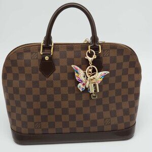 100% Auth Louis Vuitton Lock & Key with unbranded Bagcharm, Keycharm, Keychain